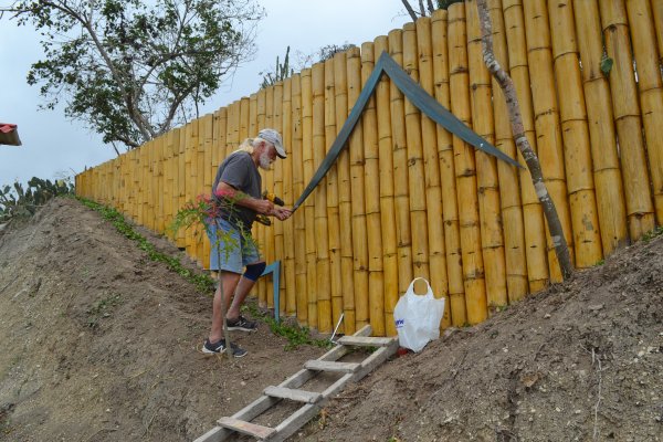 Attaching our logo to the bamboo